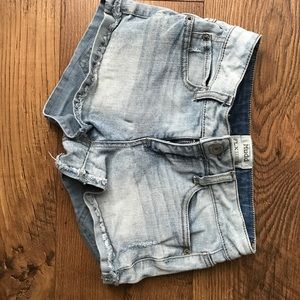 Light blue jean shorts.